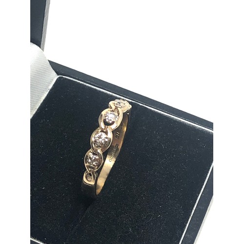 64 - 9ct gold diamond ring weight 2.6g 0.14ct diamonds