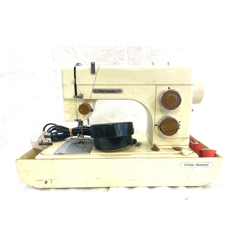 199 - Frister Rossman electric sewing machine 0001281 and a Overlock machine both untested