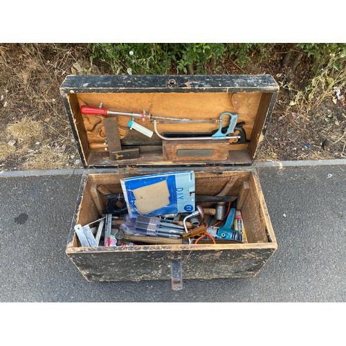 323 - Large wooden toolbox with contents includes hammers saws screw drivers etc tool box measures 19 inch... 