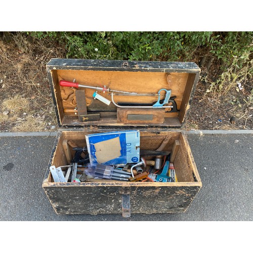 323 - Large wooden toolbox with contents includes hammers saws screw drivers etc tool box measures 19 inch... 