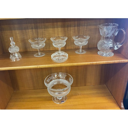 123 - Selection of Edinburgh crystal to include Fruit bowl, Water Jug, Bell etc