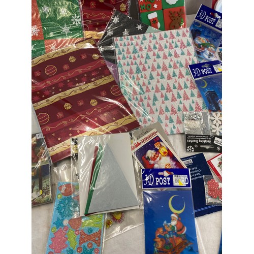 255 - A selection of assorted Christmas craft items to include post cards, foam stamps etc