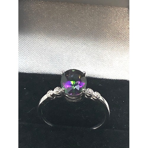 84 - 9ct white gold mystic topaz & diamond ring topaz measures approx 9mm by 7mm with 2 diamonds either s... 