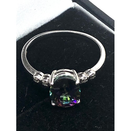 84 - 9ct white gold mystic topaz & diamond ring topaz measures approx 9mm by 7mm with 2 diamonds either s... 