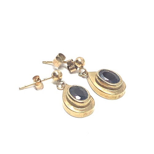 93 - 9ct gold garnet earrings weight 1.8g