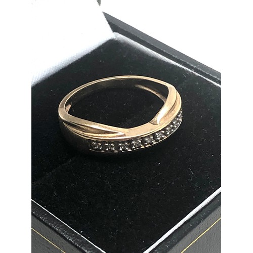 94 - 9ct gold diamond ring weight 2.1g