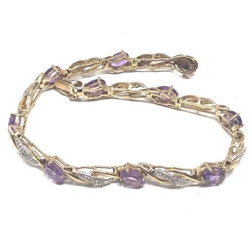 97 - 9ct gold amethyst & diamond  bracelet weight 7g