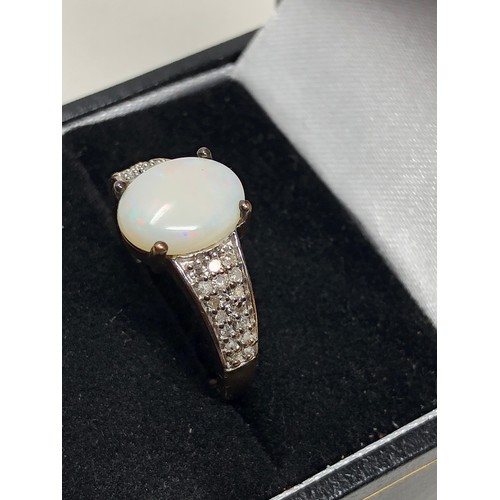 100 - 9ct gold opal & diamond ring weight 2.7g