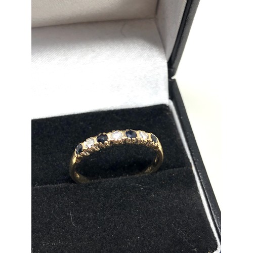 102 - 9ct gold  sapphire & diamond ring weight 1.8g 0.10ct diamonds