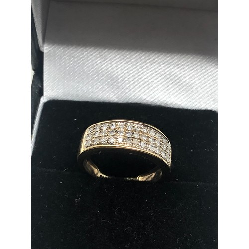 103 - 9ct gold  diamond ring weight 2.6g 0.25ct diamonds