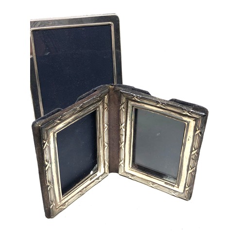 2 - 2 silver picture frames largest measures approx 15cm by 11cm