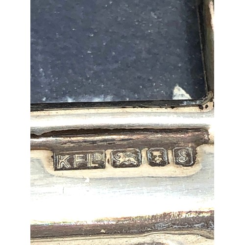 2 - 2 silver picture frames largest measures approx 15cm by 11cm