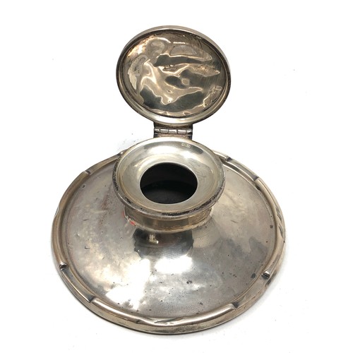 33 - silver table inkwell worn condition measures approx 11.5cm dia