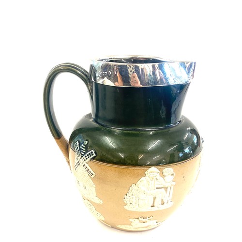 131 - Antique silver mounted Doulton Lambeth stoneware harvest jug, overall height 7 inches