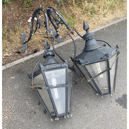 305 - Pair of wall hanging vintage lanterns, with brackets, 
approximate height of lantern: 27 inches