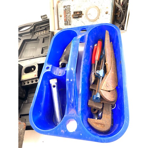 303 - Selection of tools to include drill and accessories, battery charger, drill bits