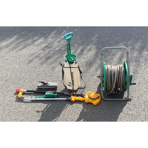 292 - Selection of garden tools to include hose pipe on reel, sprayers etc