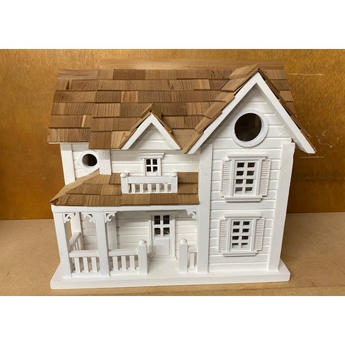 63 - Decorative house design bird house, approximate measurements: Height 27cm, Width 30cm, depth 20cm