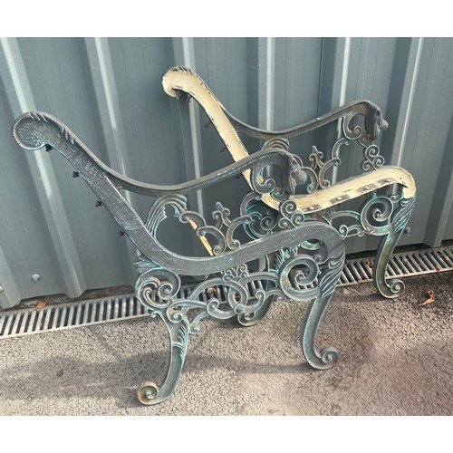 100A - A pair of cast iron bench ends