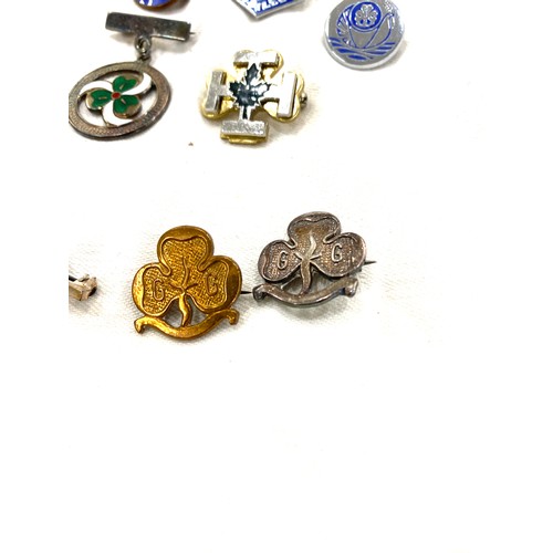 568 - Selection of Girl Guide badges includes silver and enamel badge etc