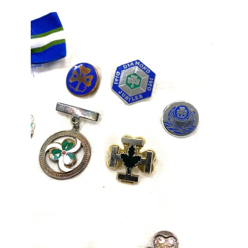 568 - Selection of Girl Guide badges includes silver and enamel badge etc