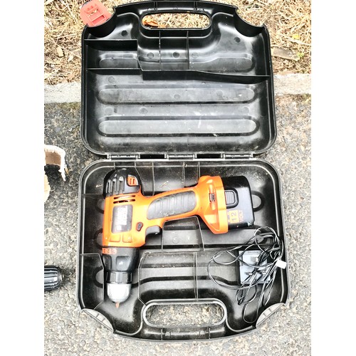 Two cordless drills one black and decker model number CD12C and a work