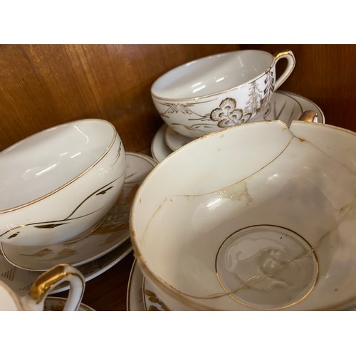 310 - Oriental Lithophane Ware to include 6 coffee cups, milk jug, sugar pot, five tea cups 1 repaired, su... 