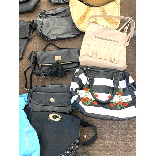 284 - Large selection of ladies handbags