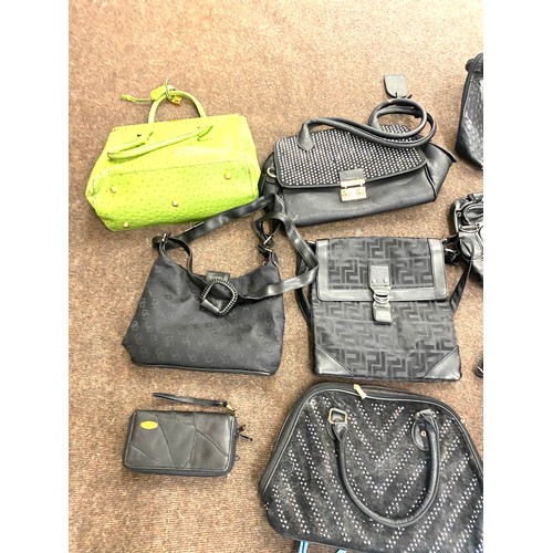 284 - Large selection of ladies handbags