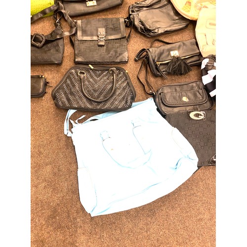 284 - Large selection of ladies handbags