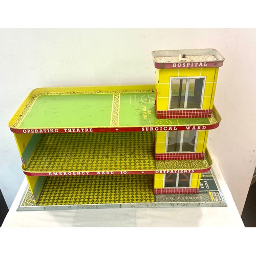 134 - Vintage Mettoy children's general hospital tin building / garage, approximate measurements: Height 1... 