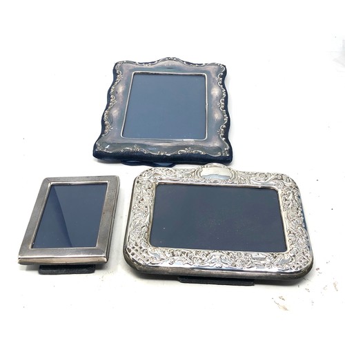 25 - 3 silver picture frames largest measures approx 21cm by 15cm