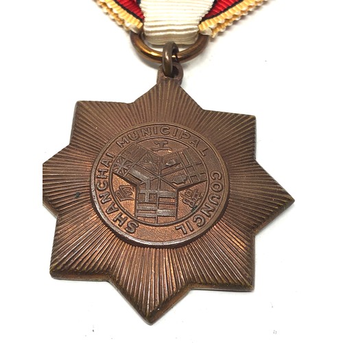 457 - Rare shanghai municipal council 1937 emergency medal China. . Bronze. Eight-pointed star. On origina... 