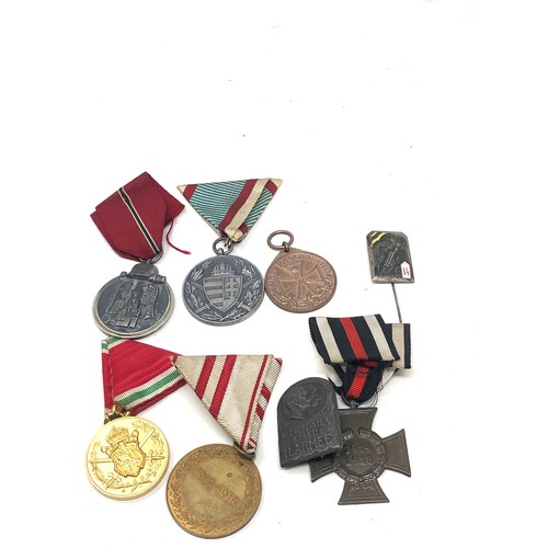 463 - collection of ww1 &ww2 medals & badges includes german ww2 eastern front ww1 hungary medal etc