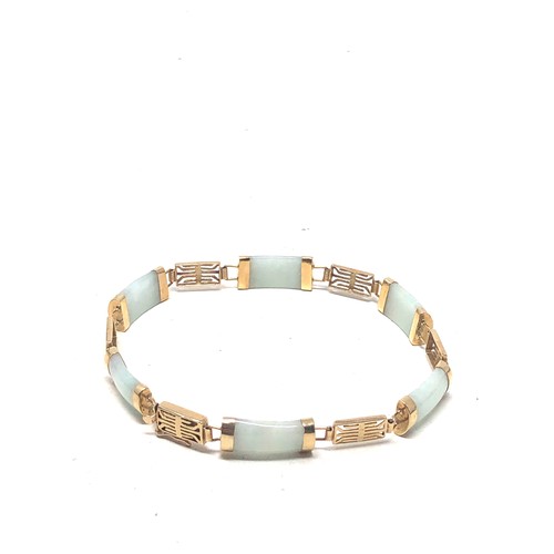 338 - 9ct gold jade panel bracelet (8.3g)