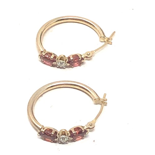 275 - 9ct gold garnet & diamond hoop earrings (1.1g)