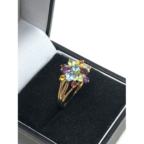 283 - 9ct gold garnet, amethyst, peridot, topaz & citrine cluster ring (2.8g)