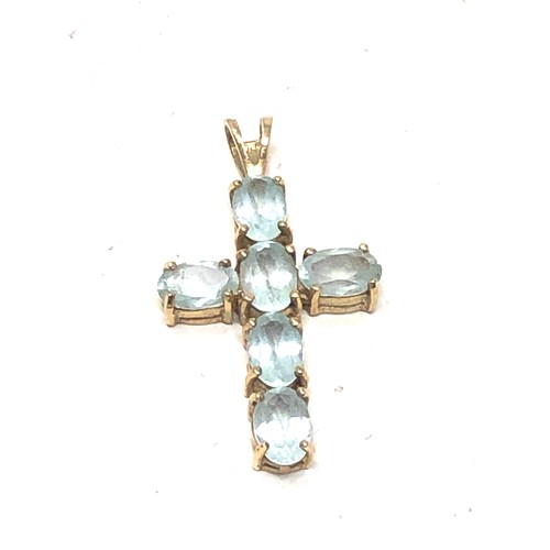 270 - 9ct gold blue topaz set cross pendant (1.7g)