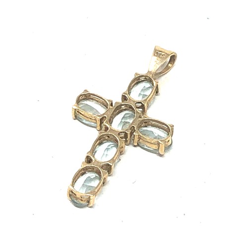 270 - 9ct gold blue topaz set cross pendant (1.7g)