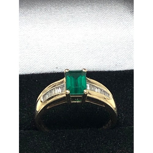 299 - 9ct gold synthetic emerald & diamond  ring (3.2g)