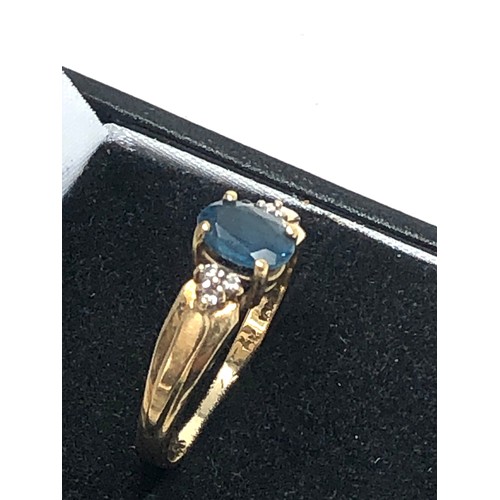 303 - 9ct gold topaz & diamond ring (2.4g)