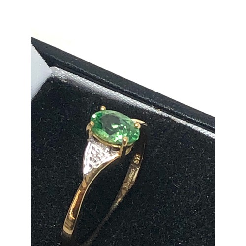 305 - 9ct gold green garnet & diamond ring (1.4g)