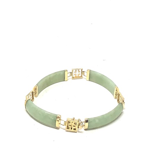 234 - 9ct gold jade panel bracelet (12.3g)