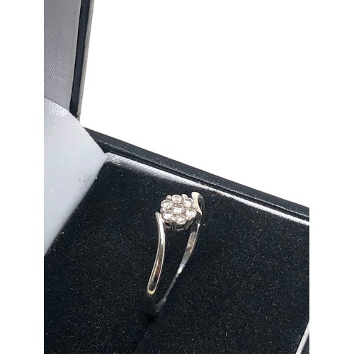 244 - 9ct white gold diamond cluster ring (1.2g)