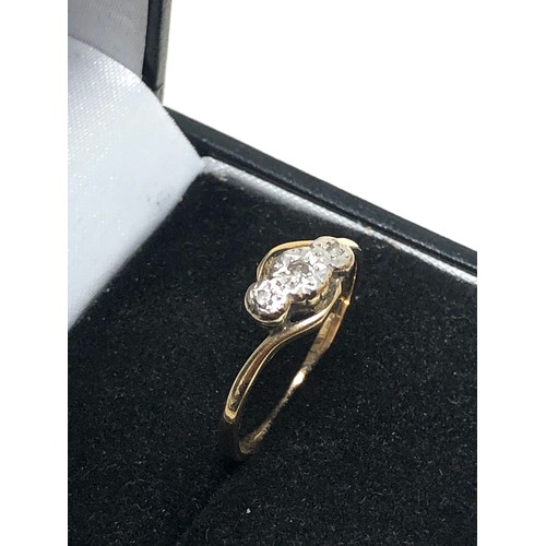 253 - 9ct gold diamond trilogy ring (2g)