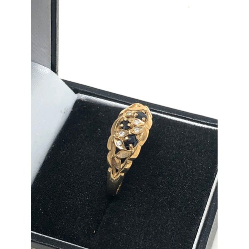 254 - 9ct gold sapphire & diamond ring (2.3g)