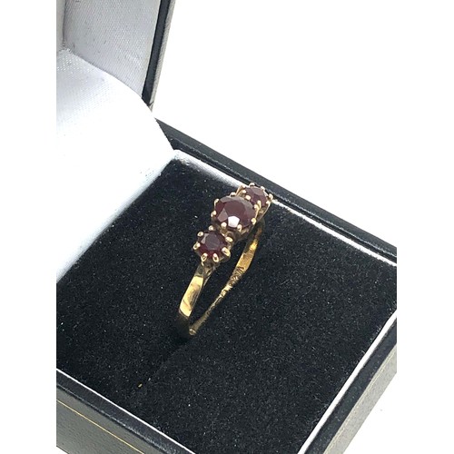 258 - 9ct gold garnet ring (1.9g)