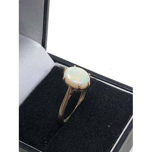 311 - 9ct gold opal ring (2g)