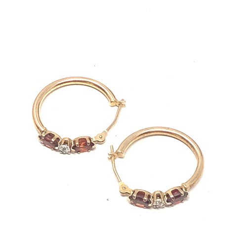 317 - 9ct gold garnet & diamond hoop earrings (1.1g)