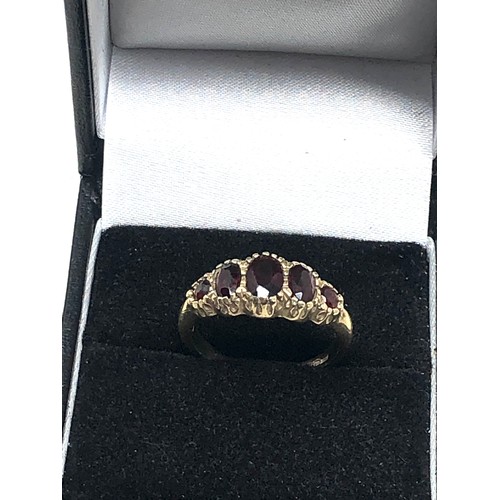 187 - 9ct gold garnet ring (2.4g)